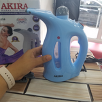 Plancha a vapor para ropa y rostro