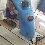 Plancha a vapor para ropa y rostro